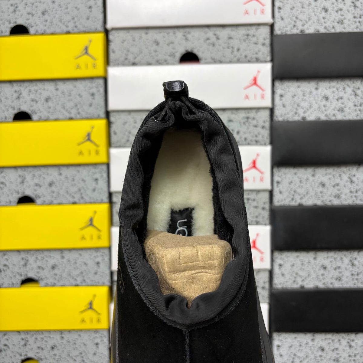 UGG Black Slip-On Shoes with Toggle Collar and Chunky Lug Sole