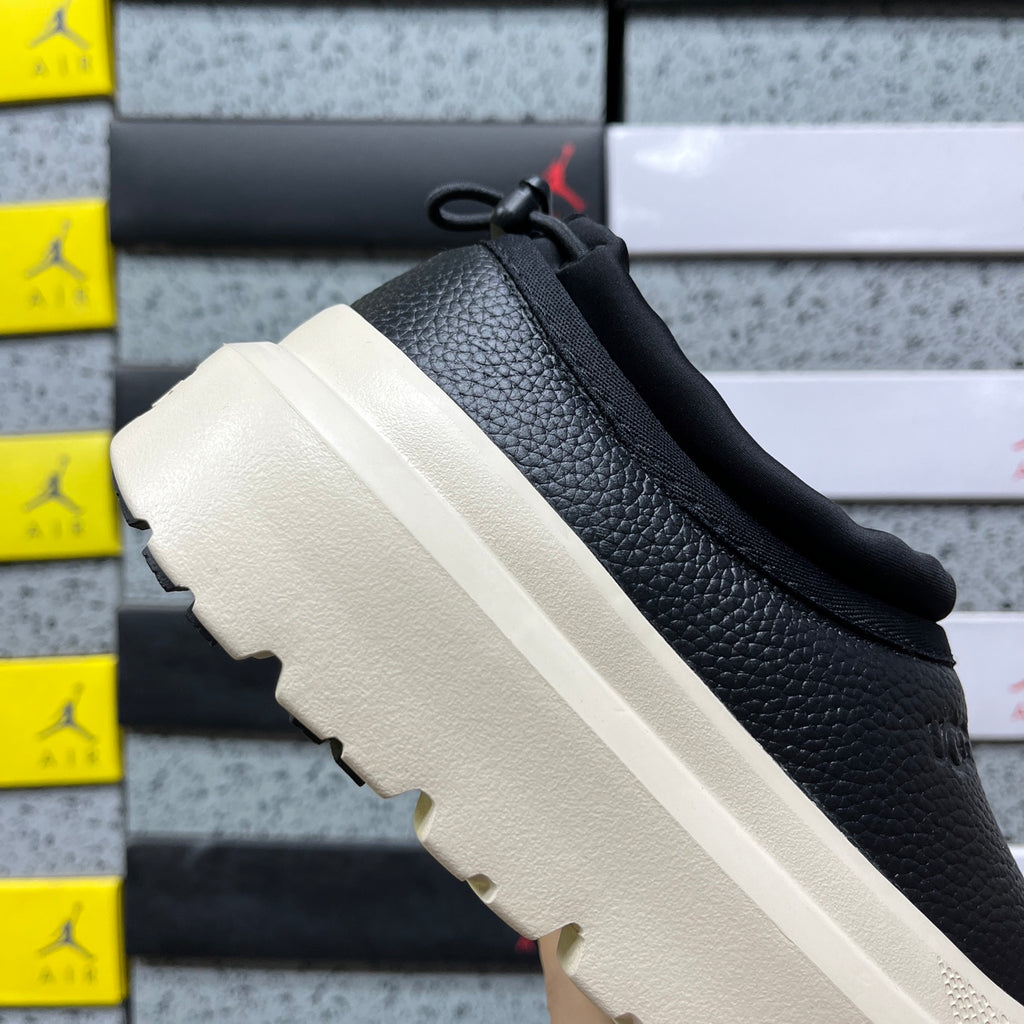 UGG Black Drawstring Slip-On Shoes with Cream Chunky Sole